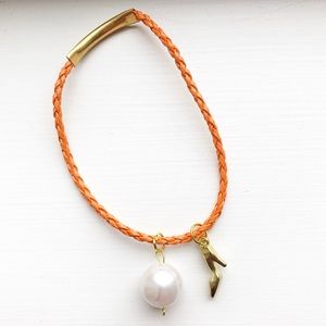 Orange braided leather stiletto charm bracelet